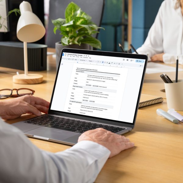 Marketing strategy template for freelancers, studios and small businesses by Project Syntax Solutions shown on a laptop screen