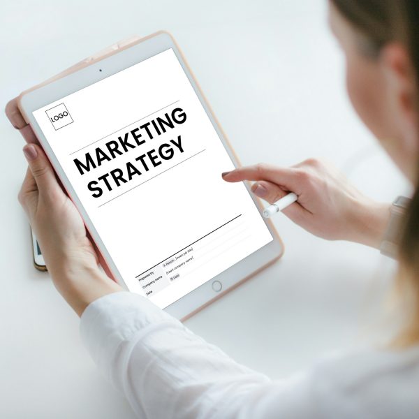 Marketing strategy template for freelancers, studios and small businesses by Project Syntax Solutions shown on a tablet screen