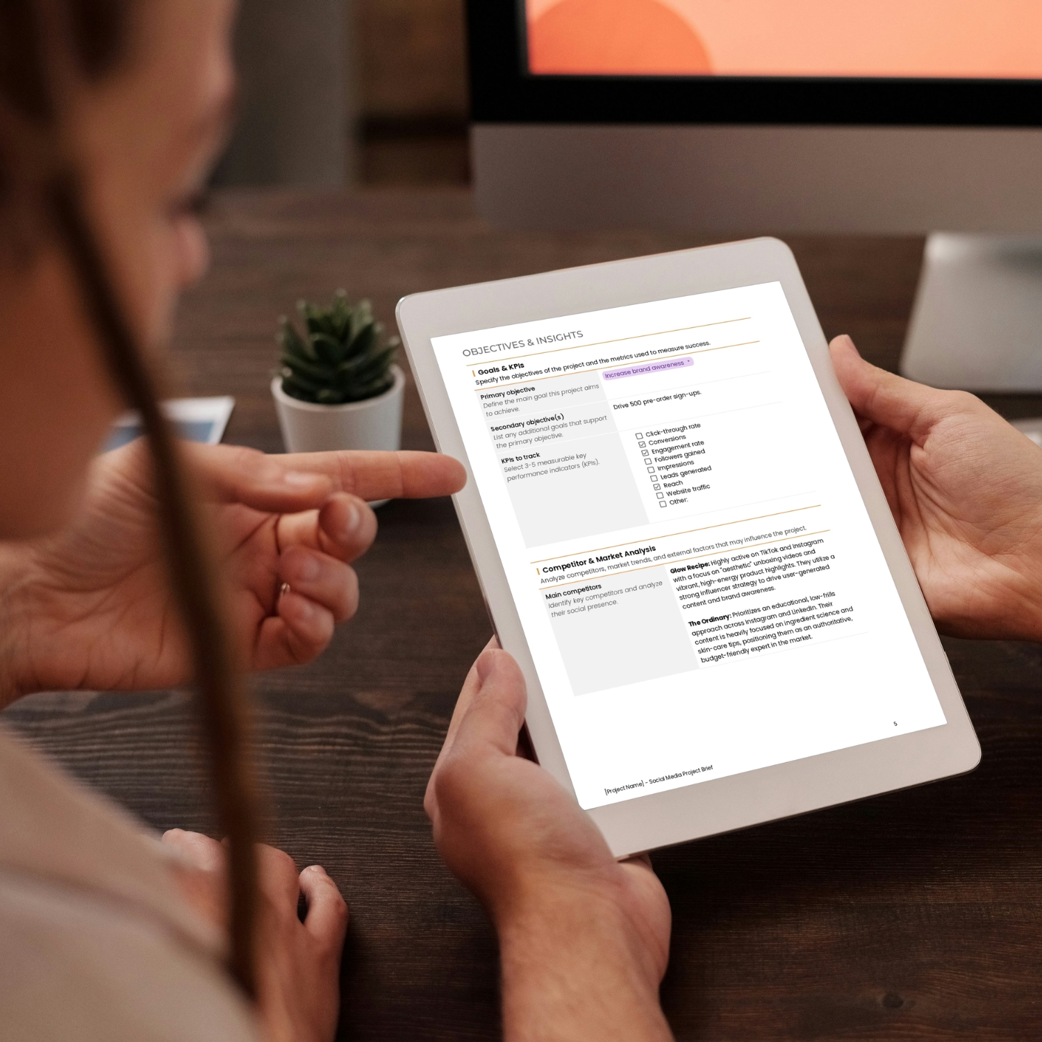 Social media project brief template for freelancers, studios and small businesses by Syntax Project Solutions shown on a tablet screen